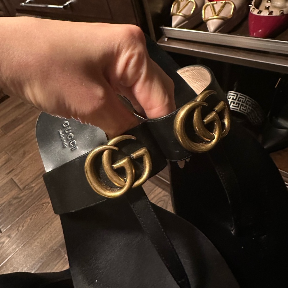 Gucci Black Slides with Gold Emblem